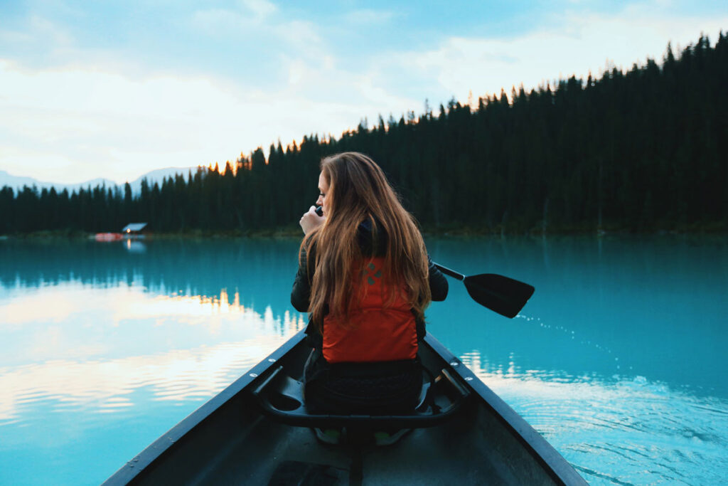 girl in a canoe on a lake