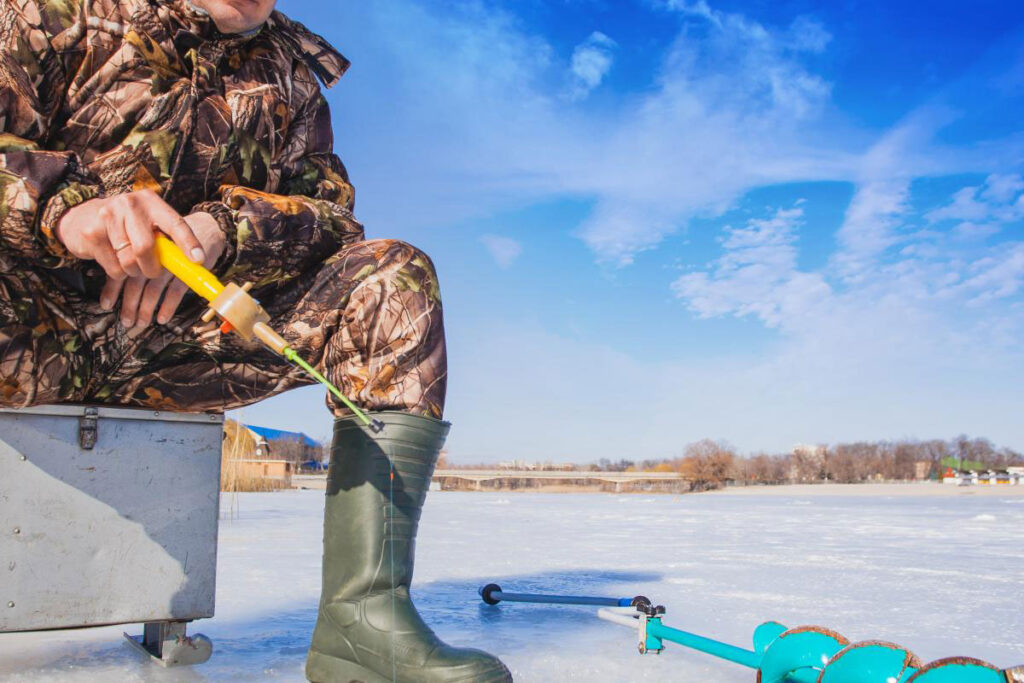 person ice fishing