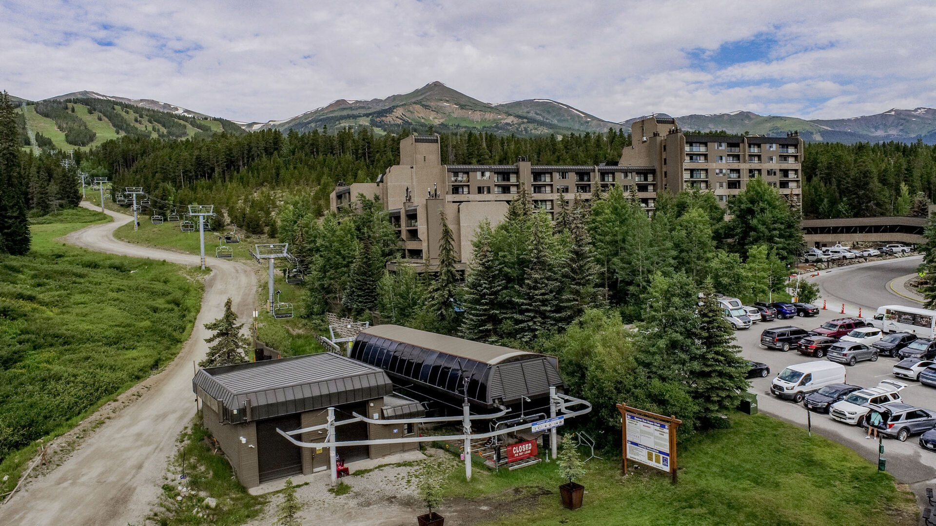 beaver run summer exterior drone shot of building 4 and chairlift