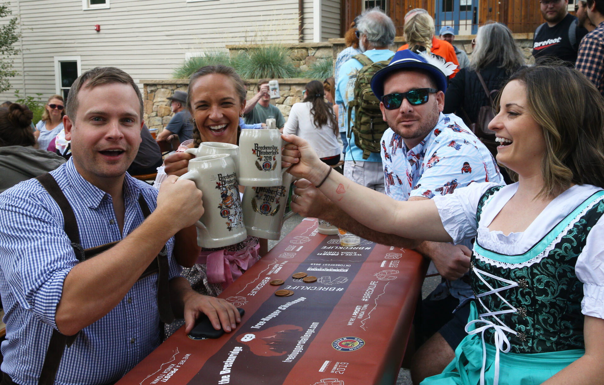 peaople cheersing at oktoberfest